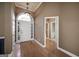 Spacious entryway with hardwood floors and a view into an adjoining bathroom at 152 Wexford Ct, Stockbridge, GA 30281