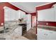 Well-equipped kitchen featuring granite countertops, stainless steel appliances, and white cabinetry at 152 Wexford Ct, Stockbridge, GA 30281