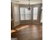 Open concept kitchen featuring a breakfast nook with hardwood floors and lots of natural light at 460 Ridgewood Dr, Fayetteville, GA 30215