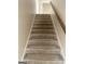 Carpeted stairway leading to the upper level of the home at 460 Ridgewood Dr, Fayetteville, GA 30215