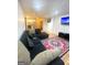 Cozy living room with a large sectional sofa and hardwood floors at 2285 Peachtree Rd # 602, Atlanta, GA 30309