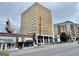 Apartment building complex with a modern facade, near a pool and commercial building at 2285 Peachtree Rd # 602, Atlanta, GA 30309