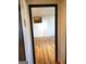 Spacious room with hardwood floors as seen through the black door frame at 2285 Peachtree Rd # 602, Atlanta, GA 30309