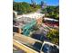 Aerial view capturing rooftops, green spaces, and the cityscape, with a glimpse of urban activity at 2285 Peachtree Rd # 602, Atlanta, GA 30309