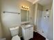 Bathroom featuring a granite vanity and a shower with white tiled walls at 791 Gertrude Nw Pl, Atlanta, GA 30318