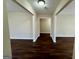 The spacious living room features dark wood floors and plenty of natural light at 791 Gertrude Nw Pl, Atlanta, GA 30318