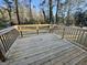 Spacious wooden back deck perfect for outdoor entertaining and enjoying the serene wooded backyard views at 2205 Chestnut Hill Cir, Decatur, GA 30032