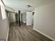 This basement has neutral walls and flooring with black beams, plus multiple doorways leading to various spaces at 2690 Rollingwood Se Ln, Atlanta, GA 30316