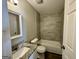Bathroom featuring granite countertops, new tile surround and a white vanity at 2690 Rollingwood Se Ln, Atlanta, GA 30316
