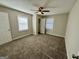 Well-lit bedroom featuring neutral paint, blinds and neutral carpet at 2690 Rollingwood Se Ln, Atlanta, GA 30316