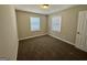 Cozy bedroom with neutral walls and soft carpeting at 2690 Rollingwood Se Ln, Atlanta, GA 30316