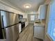 Updated kitchen with stainless steel appliances, granite countertops, and sleek cabinets at 2690 Rollingwood Se Ln, Atlanta, GA 30316