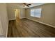 Spacious room featuring wood floors, neutral walls, and ample natural light at 2690 Rollingwood Se Ln, Atlanta, GA 30316