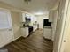 Newly renovated kitchen with granite countertops, stainless steel appliances and modern cabinetry at 6380 Phillips Pl, Lithonia, GA 30058