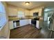 Updated kitchen featuring stainless steel appliances, granite countertops, and modern white cabinets at 1965 Rollingwood Se Dr, Atlanta, GA 30316