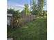 View of a backyard with a wooden fence and grass at 1225 Pitts Chapel E, Newborn, GA 30056