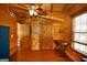 Bedroom with wooden walls and floors and wooden doors at 1225 Pitts Chapel E, Newborn, GA 30056