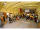 Spacious garage interior with tools, motorbikes, and ample storage, ideal for hobbies at 1225 Pitts Chapel E, Newborn, GA 30056
