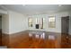 Bright living room with hardwood floors and access to the patio at 1225 Pitts Chapel E, Newborn, GA 30056