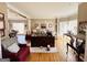 Bright living room featuring hardwood floors, large windows, and neutral tones, creating a warm atmosphere at 6302 Manassas Nw Pass, Acworth, GA 30101