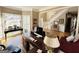 Bright living room featuring hardwood floors, large windows, and neutral tones, creating a warm atmosphere at 6302 Manassas Nw Pass, Acworth, GA 30101