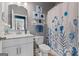 Bathroom featuring a marble-style vanity, blue accents, and a shower-tub combo at 460 Carrie Kathleen Ter, Carrollton, GA 30116