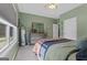 Bedroom showcasing neutral carpet and sage green walls with decor at 460 Carrie Kathleen Ter, Carrollton, GA 30116