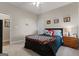 Bedroom highlighting a full bed with a quilt and pictures hanging on the wall at 460 Carrie Kathleen Ter, Carrollton, GA 30116