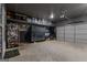 The garage has a large tool chest, garage door and lots of storage space at 460 Carrie Kathleen Ter, Carrollton, GA 30116