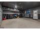 Spacious garage with ample storage, a garage door, and decorated with wall decor at 460 Carrie Kathleen Ter, Carrollton, GA 30116