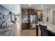 A modern kitchen featuring stainless steel appliances, granite countertops, and a cozy breakfast bar at 460 Carrie Kathleen Ter, Carrollton, GA 30116
