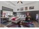 A cozy living room featuring a comfortable sectional sofa, stylish decor, and natural light from the window at 460 Carrie Kathleen Ter, Carrollton, GA 30116