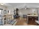 An open floor plan connects the kitchen, dining area and living room with fireplace at 460 Carrie Kathleen Ter, Carrollton, GA 30116