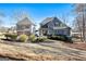 Inviting home with a detached garage, featuring neat landscaping and serene surroundings at 50 Birch Rd, Covington, GA 30014