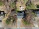 Aerial view of the property showcasing the home, yard, and surrounding landscape at 70 Willow Bend Nw Dr, Cartersville, GA 30121