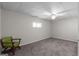 Basement area features carpeted floor and chair at 70 Willow Bend Nw Dr, Cartersville, GA 30121