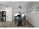 Dining area with a view of the living room, featuring modern finishes and an open layout at 70 Willow Bend Nw Dr, Cartersville, GA 30121