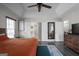 The main bedroom suite features an ensuite bath, a large closet, and dark wood flooring at 70 Willow Bend Nw Dr, Cartersville, GA 30121