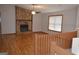 Spacious living room featuring a stone fireplace and hardwood floors at 5475 Pepperwood Ct, Stone Mountain, GA 30087