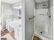 Bathroom featuring dual sinks and a shower stall at 12 Bonnie Glen Ln, Hampton, GA 30228