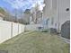 Fenced backyard with a table and chairs at 747 S Fairfield Dr, Peachtree City, GA 30269