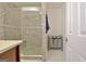 Modern bathroom with a glass shower, and gray accent tiles at 747 S Fairfield Dr, Peachtree City, GA 30269