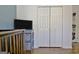 Bright bedroom with a closet and shelving at 747 S Fairfield Dr, Peachtree City, GA 30269