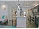 Bright and airy kitchen with stainless steel appliances and breakfast bar seating at 747 S Fairfield Dr, Peachtree City, GA 30269