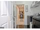 Well-equipped laundry room with modern appliances and convenient access to the kitchen at 747 S Fairfield Dr, Peachtree City, GA 30269