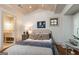 Comfortable bedroom with a queen bed, natural light, and access to an ensuite bathroom at 4421 Paradise Cir, Vinings, GA 30339