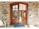 Elegant entryway featuring beautiful double doors that provide a glimpse into the home's exquisite interior at 4421 Paradise Cir, Vinings, GA 30339
