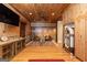 Entertaining game room with a Jukebox, built-in cabinets, and comfortable seating at 4421 Paradise Cir, Vinings, GA 30339