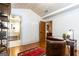 Inviting home office with ample lighting, wood floors, and adjacent bathroom at 4421 Paradise Cir, Vinings, GA 30339