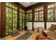 Bright sunroom with windows and natural light, perfect for relaxation and wellness at 4421 Paradise Cir, Vinings, GA 30339